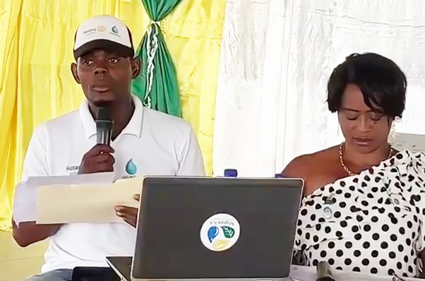 Presenting the plan l to r: Rotary Club of Leogâne Public Image Chair Yveson Pascal; President Sherly Jean Louis