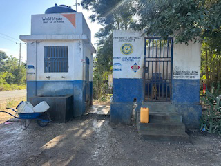 Old diesel well and solar well side by side. (Old diesel well on right)